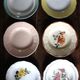 6 mismatched deep plates in floral colours from Digoin, Sarreguemines, Gien.