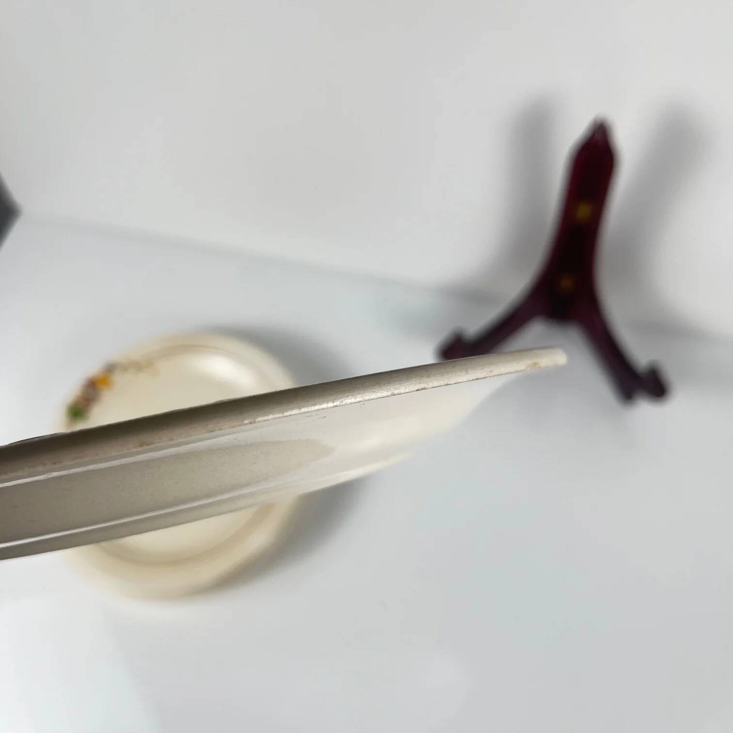 Set of 5 dessert plates Longwy, early 20th century, floral decoration.