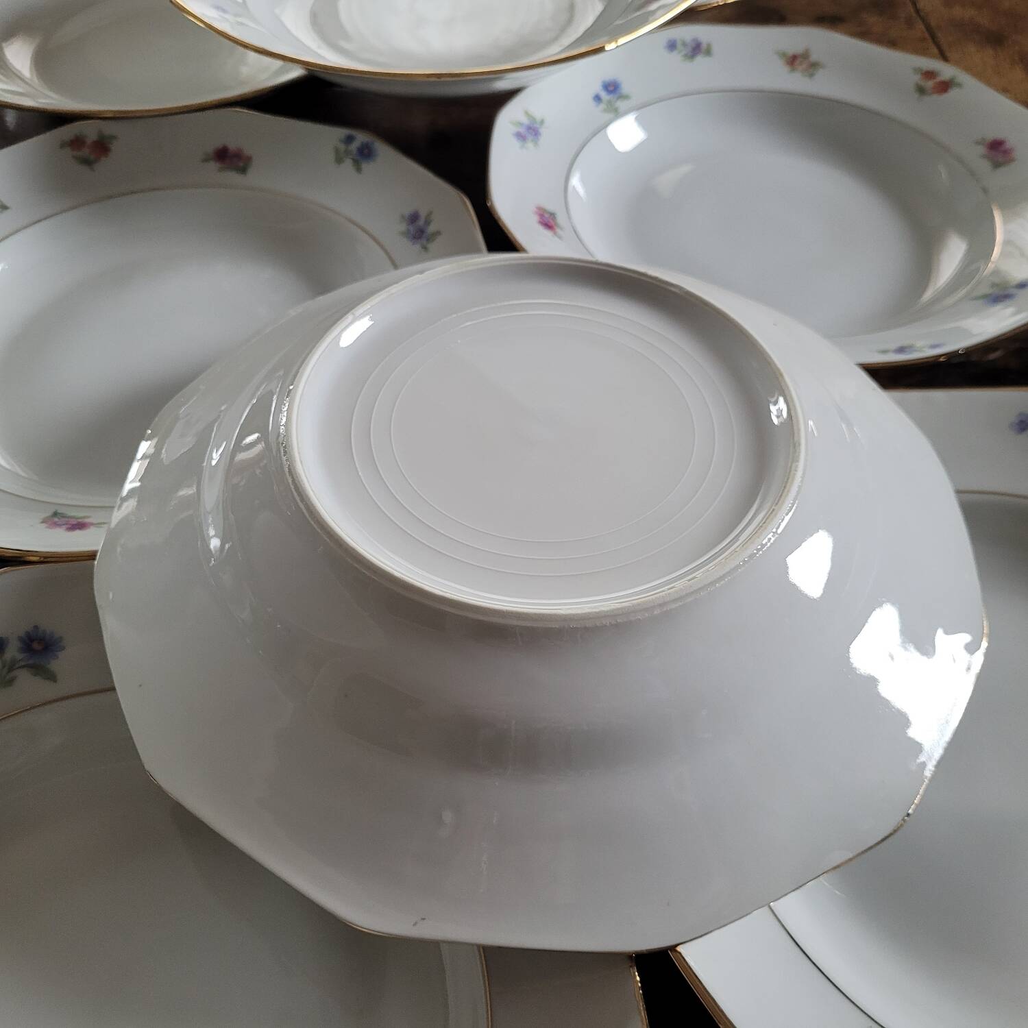 8 12-sided soup plates – floral porcelain with gold edging