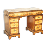 Victorian antique partner's desk in veined walnut with a leather top.