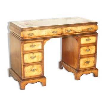 Victorian antique partner's desk in veined walnut with a leather top.