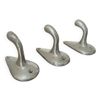 Series of 3 "streamline" aluminum coat hooks from the 60s and 70s