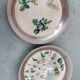 Duo of sub bouteilles or metal and ceramic coasters