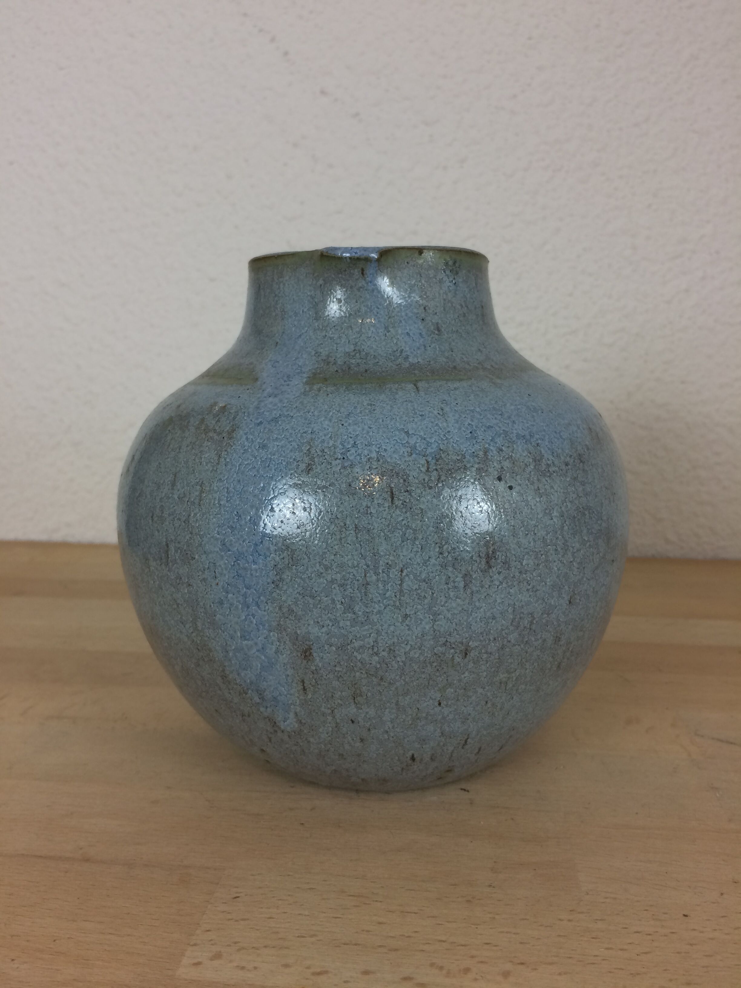 Blue ceramic ball vase signed