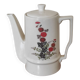 Small coffee maker with floral decoration