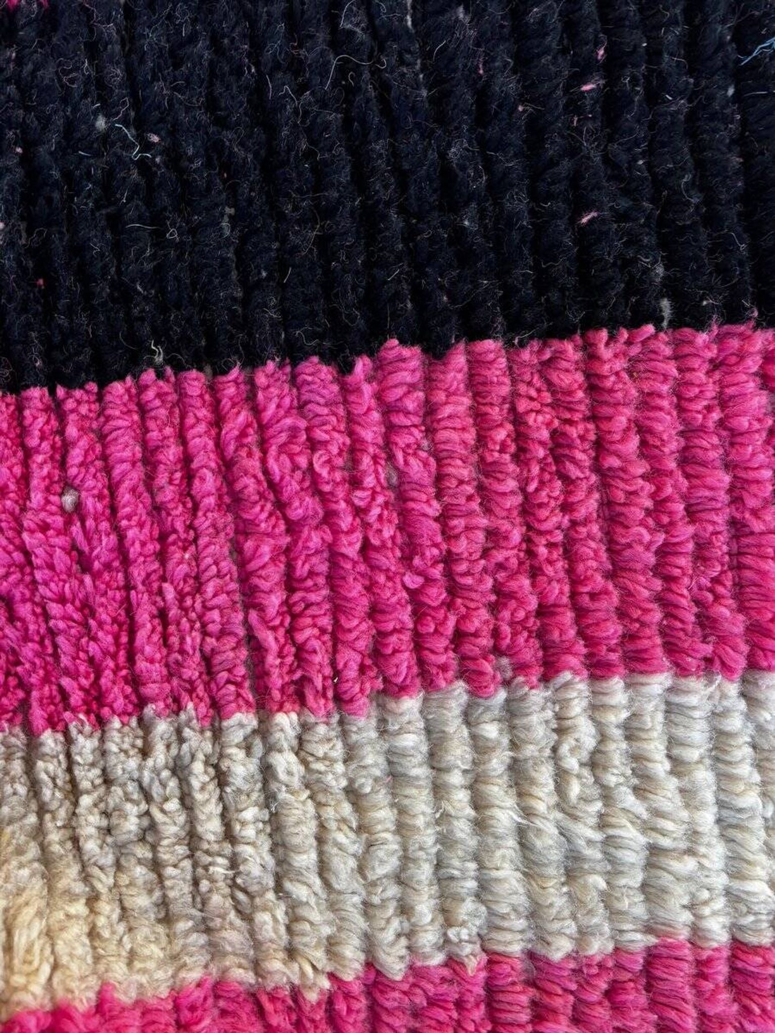 Moroccan Berber rug corridor in pink and blue wool.