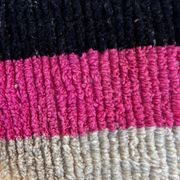 Moroccan Berber rug corridor in pink and blue wool.