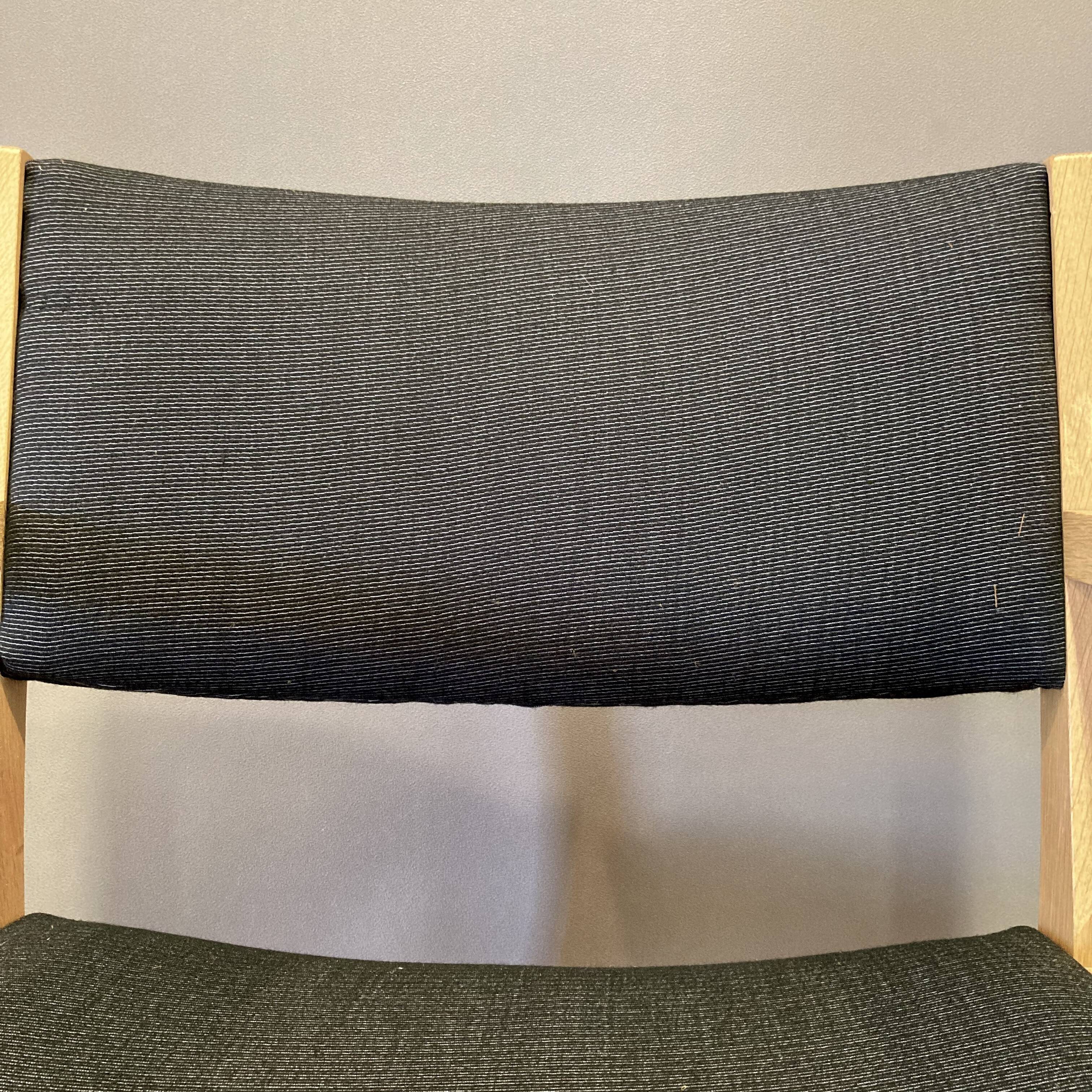 Designer armchair “hans wegner” 1960.