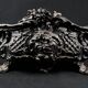 Antique black cast iron planter from the late 19th century Rocaille style