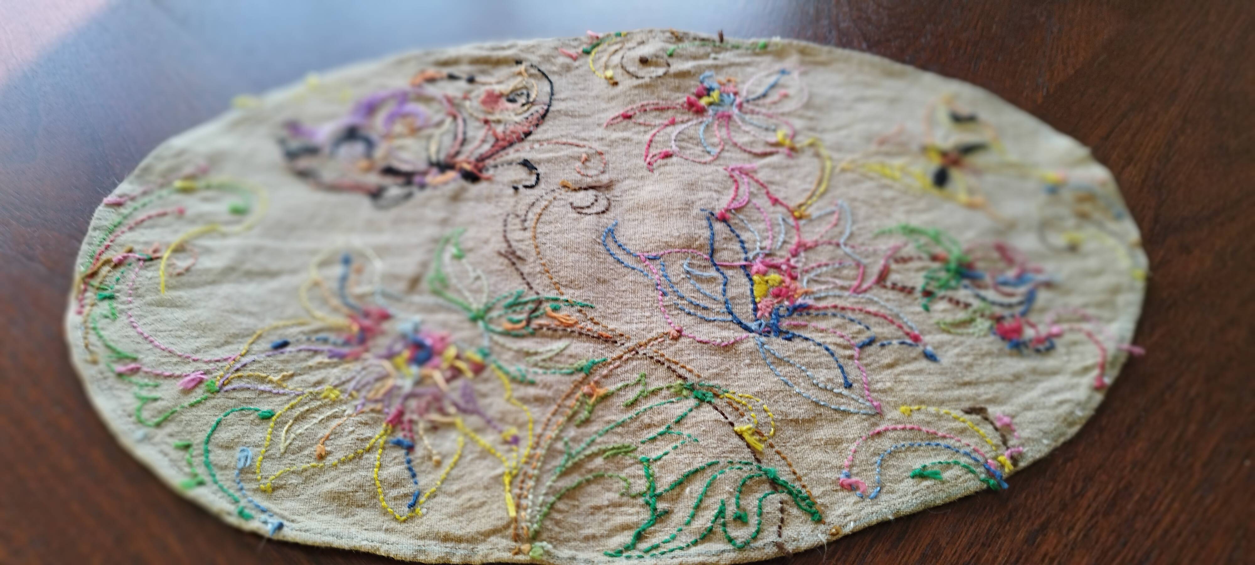Antique embroidered placemat