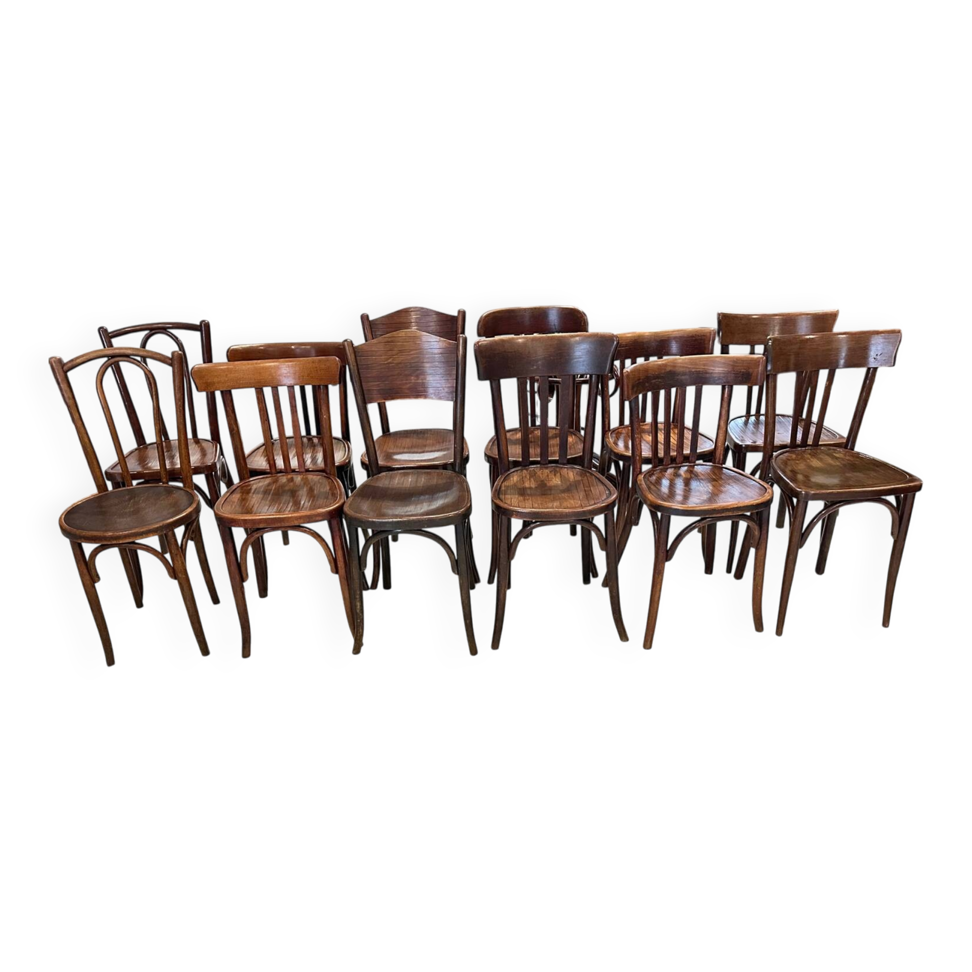 Set of 12 mismatched bistro chairs Baumann & Fischel 1930