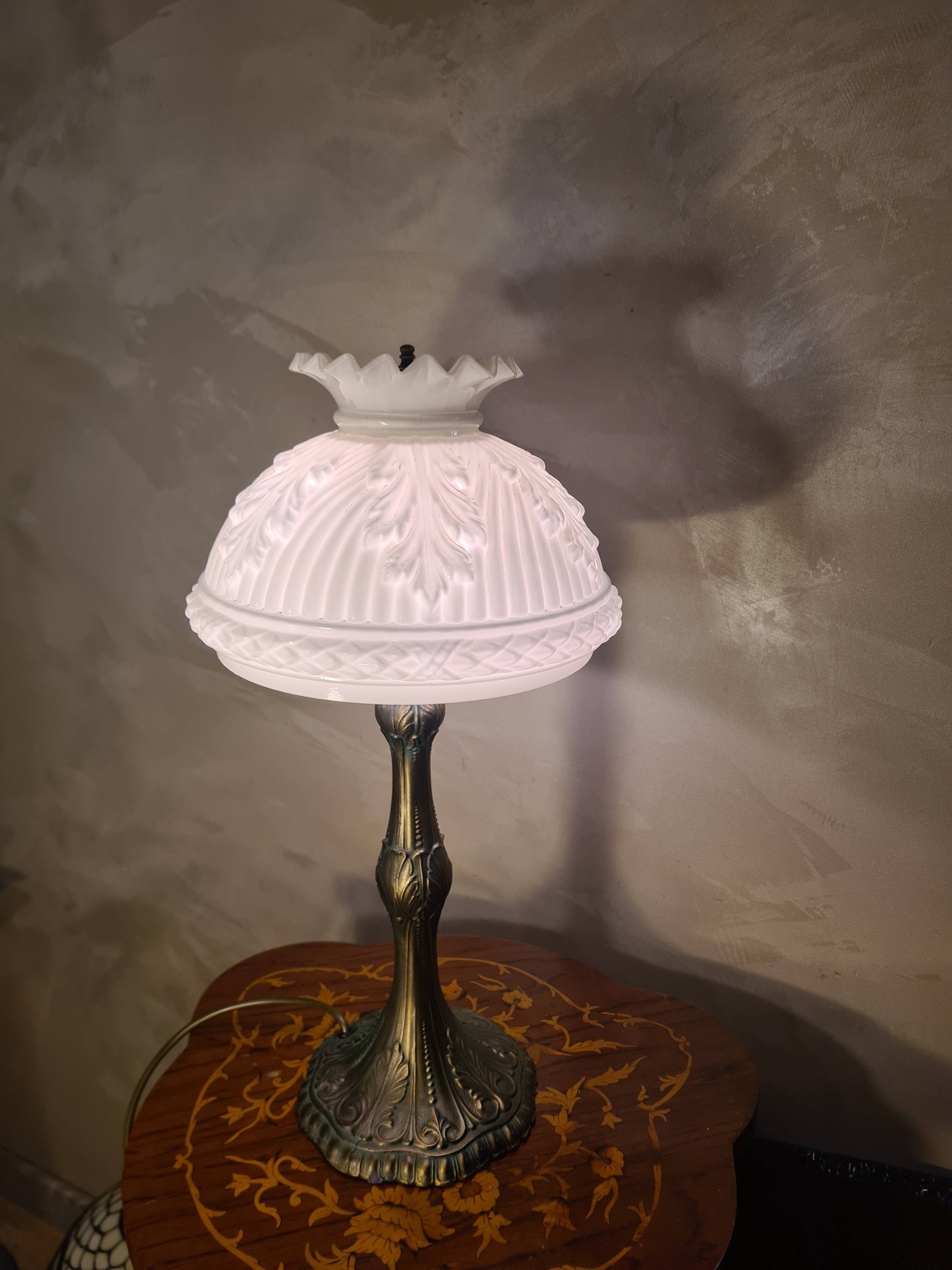 Patinated regulable lamp with a moulded white opaline shade from 1900, 52x26, very beautiful.