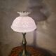 Patinated regulable lamp with a moulded white opaline shade from 1900, 52x26, very beautiful.