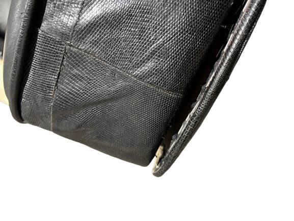 Pair of leather armchairs with marquetry armrests