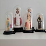 Lot de 7 personnages religieux sous globe