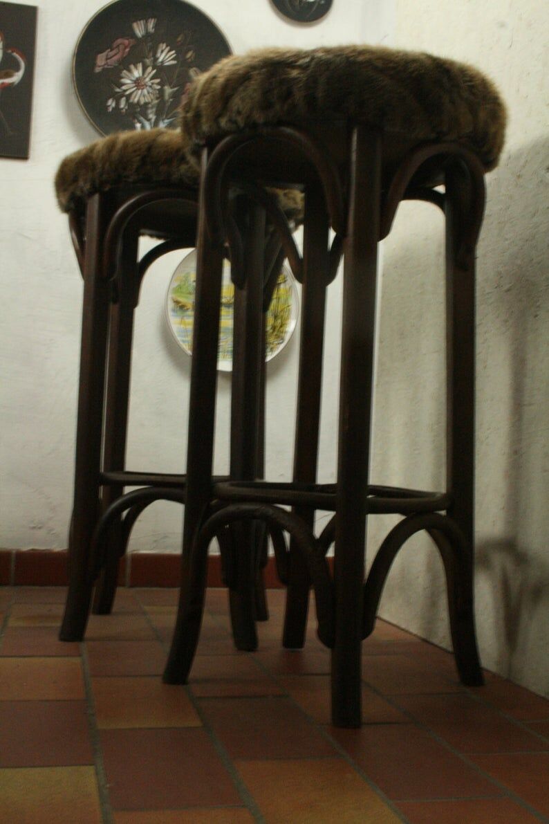 Two vintage folded wooden bar stools