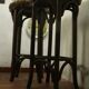 Two vintage folded wooden bar stools