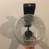 Black metal and molded glass wall sconce