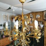 Gilded brass chandelier and silver lily of the valley bells