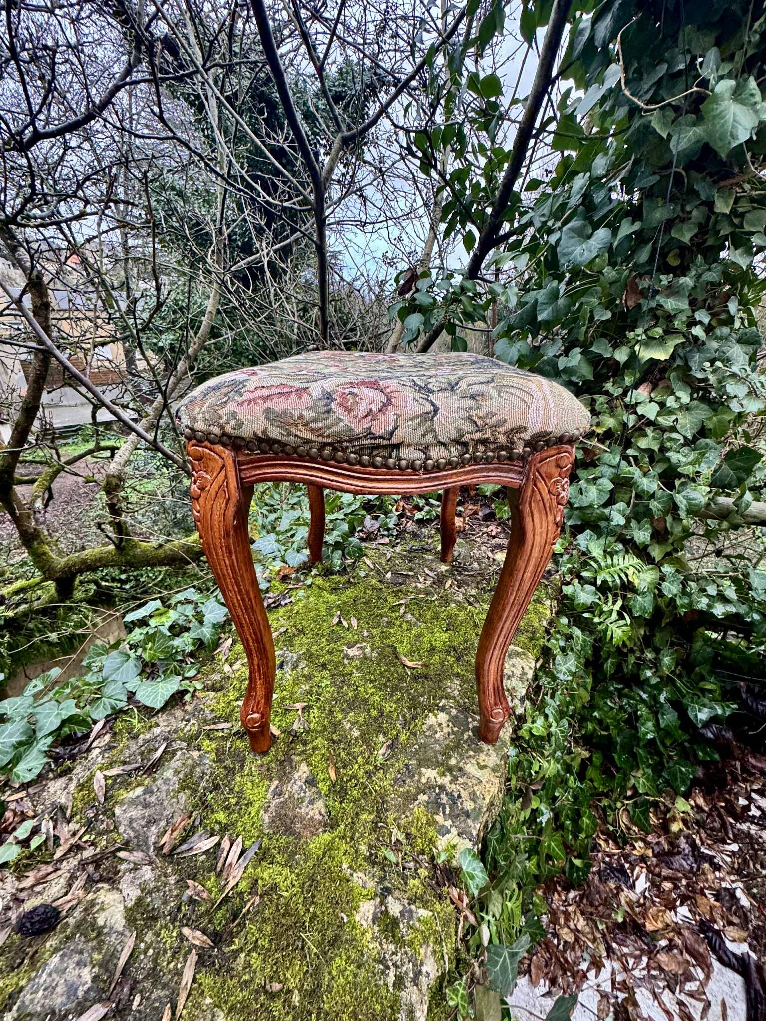 Large antique footrest in the Louis XV style.