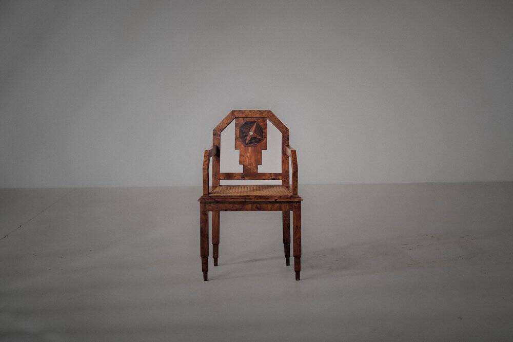 Art Deco armchair, marquetry and cane, circa 1930