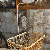 Rattan cradle with arrow