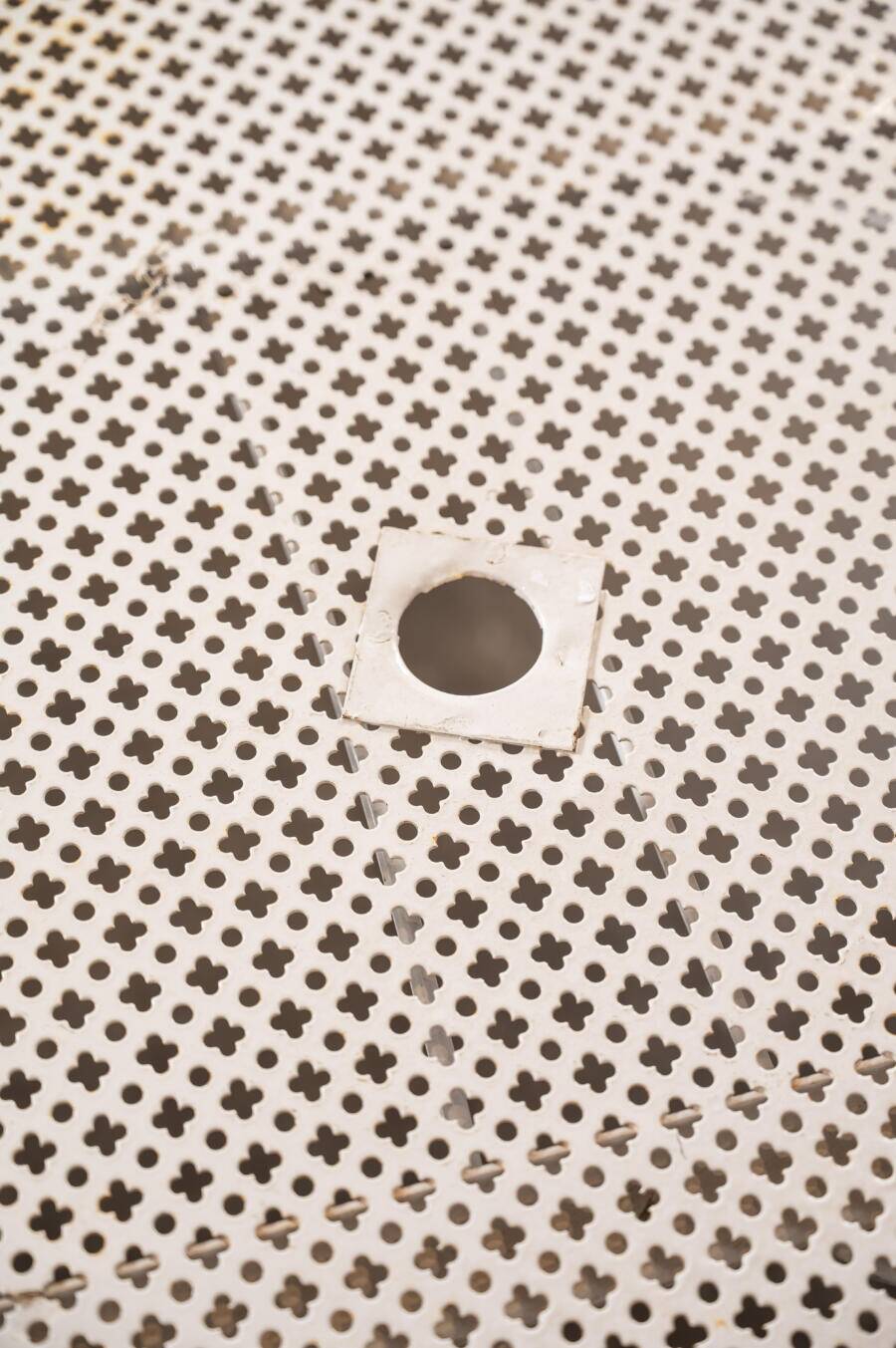 Perforated metal garden table