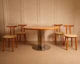 Circular dining table