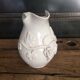 White enamelled ceramic pitcher signed emile tessier malicorne grape bunch
