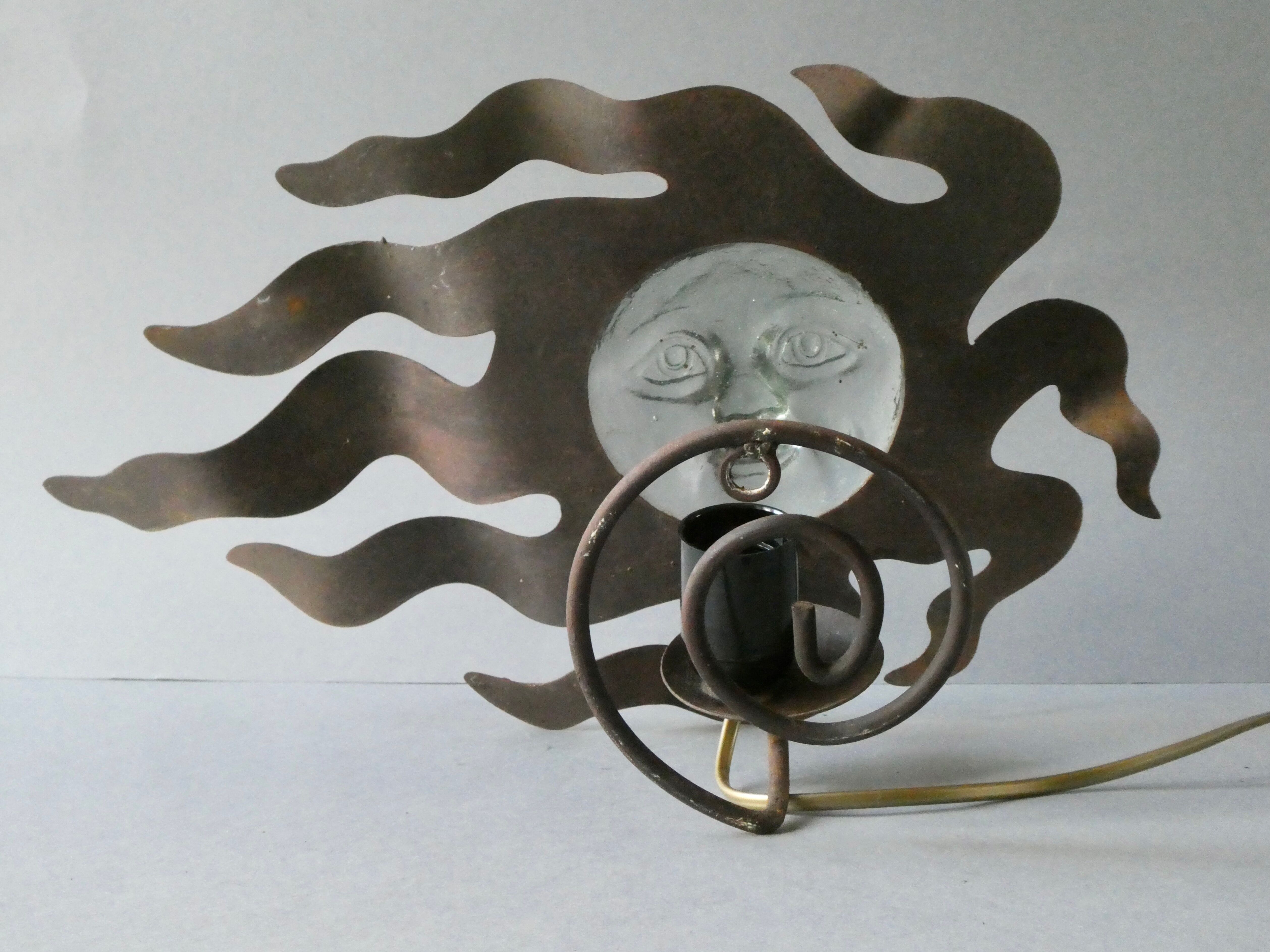 Sun lamp in metal and glass of the 80s