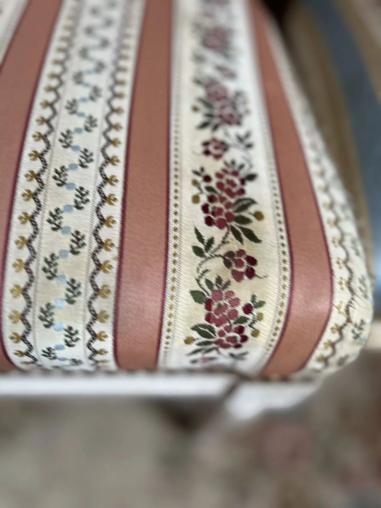 Pair of Louis XVI style chairs in painted wood and satin, classic elegance.