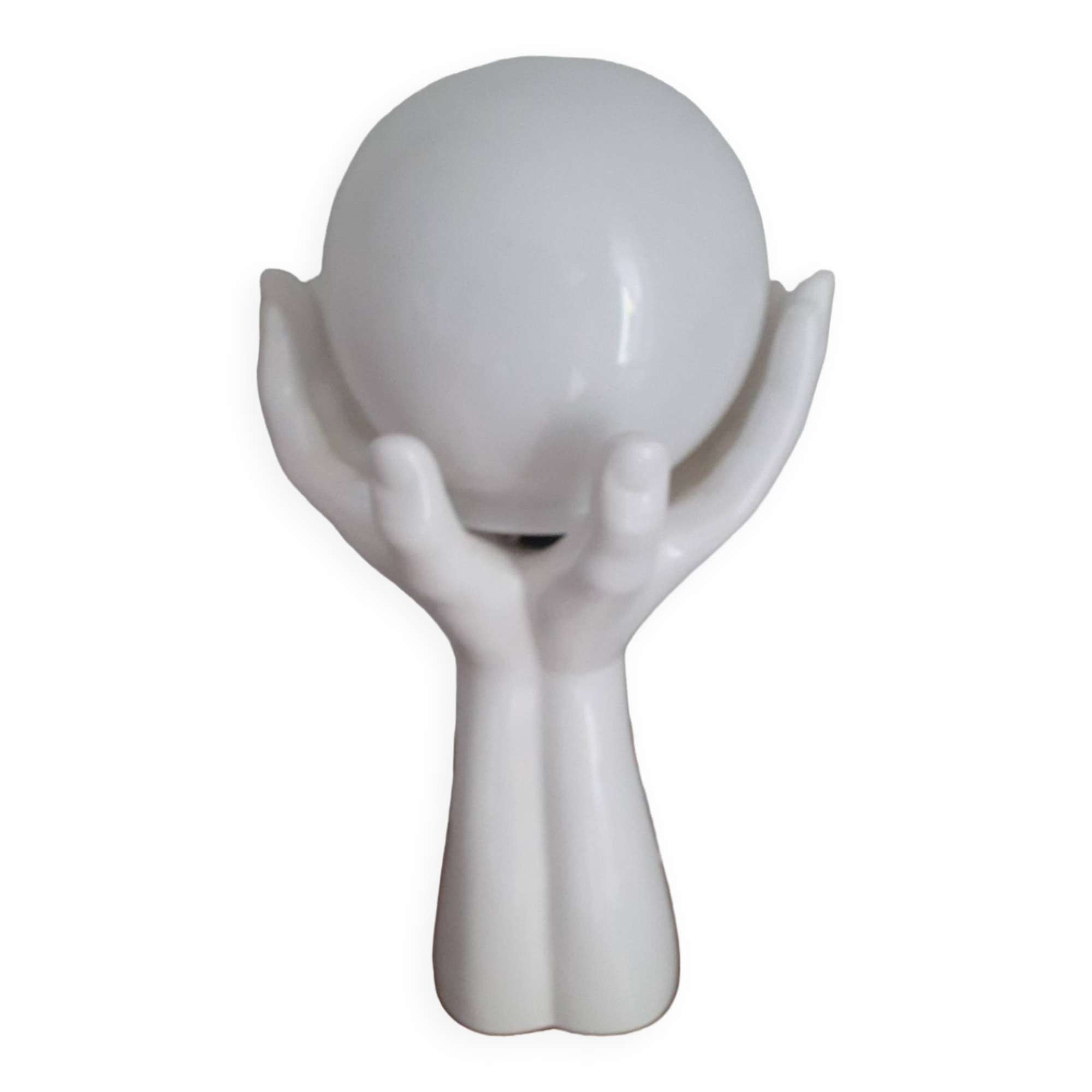 70s lamp two hands embrace an opaline globe