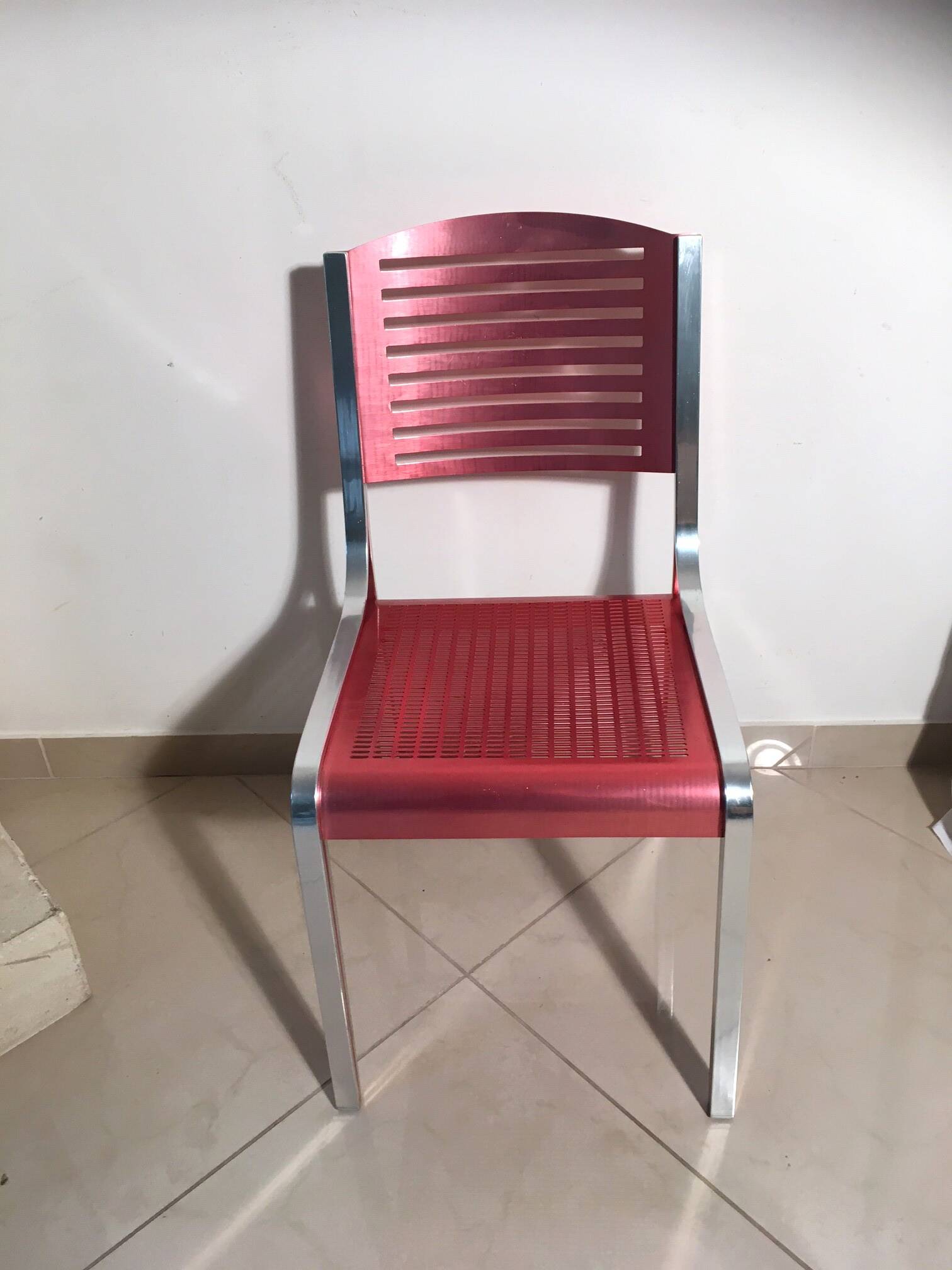 Pink chrome metal chair