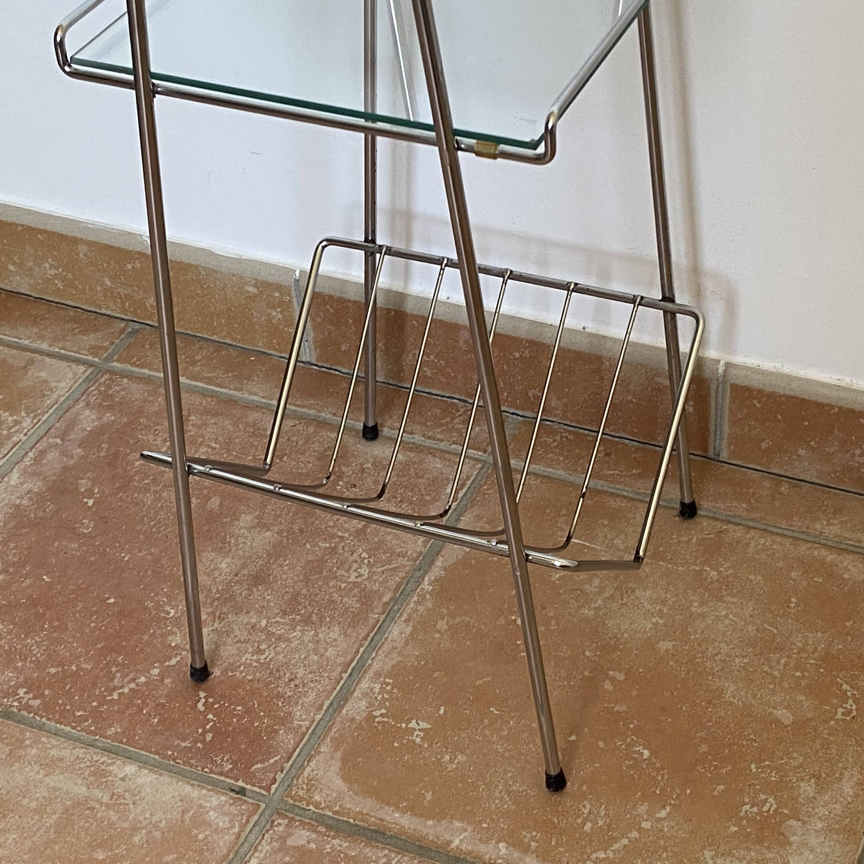 Chrome and glass side table. 1970s. Space Age.