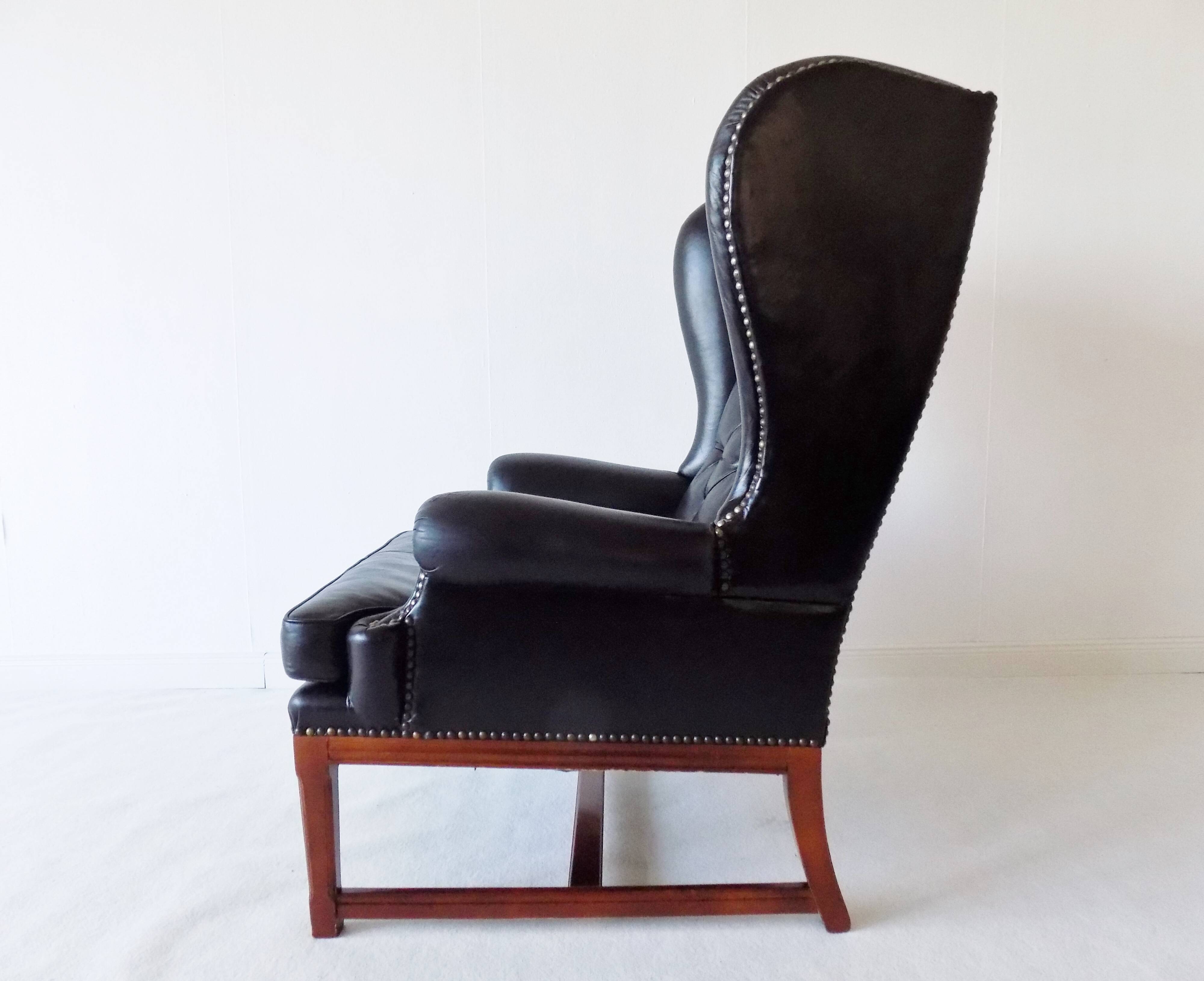 Chesterfield high back leather armchair black from the 1960s