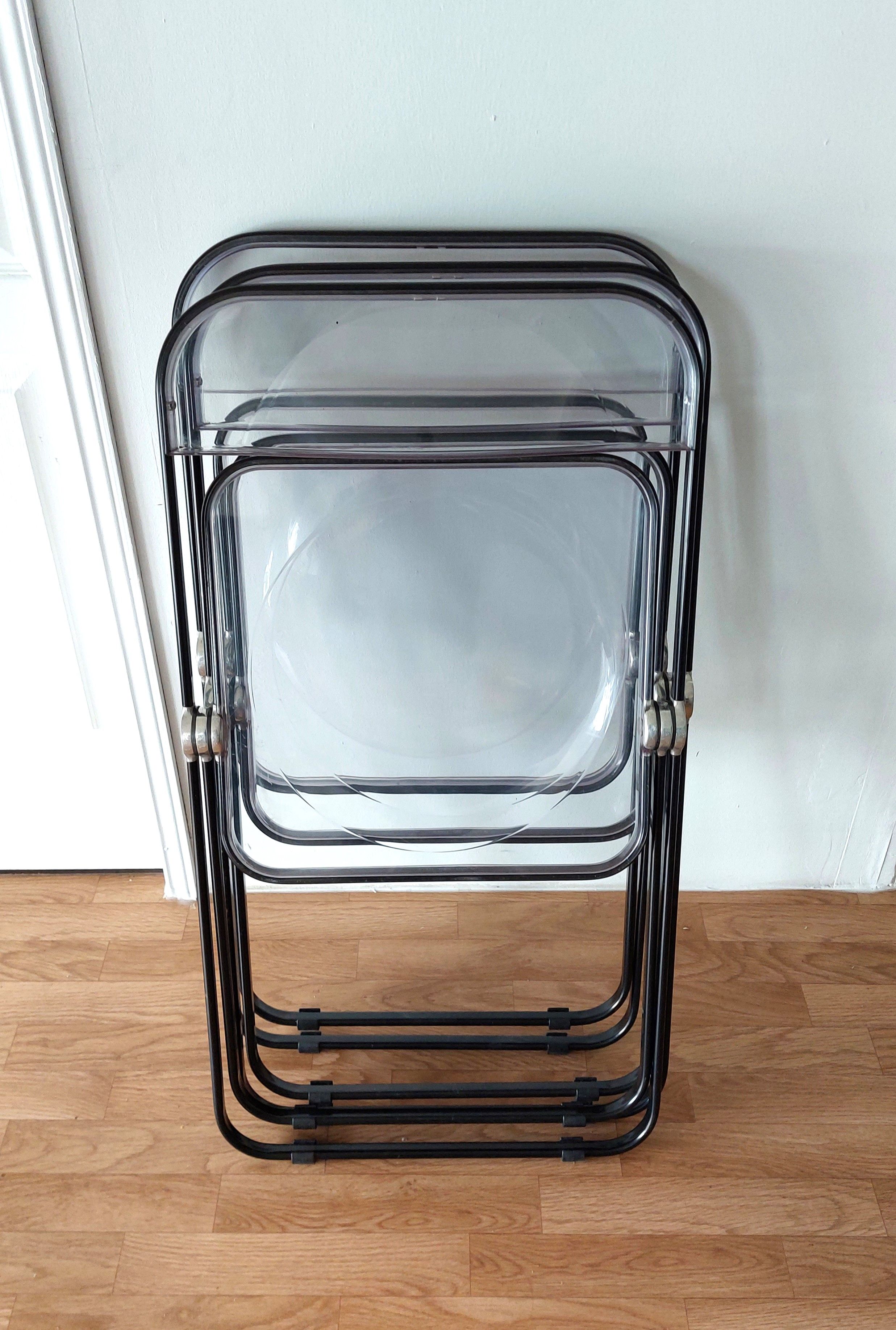 Series of 3 black and transparent Plia chairs Giancalo Piretti for Castelli, 1980.