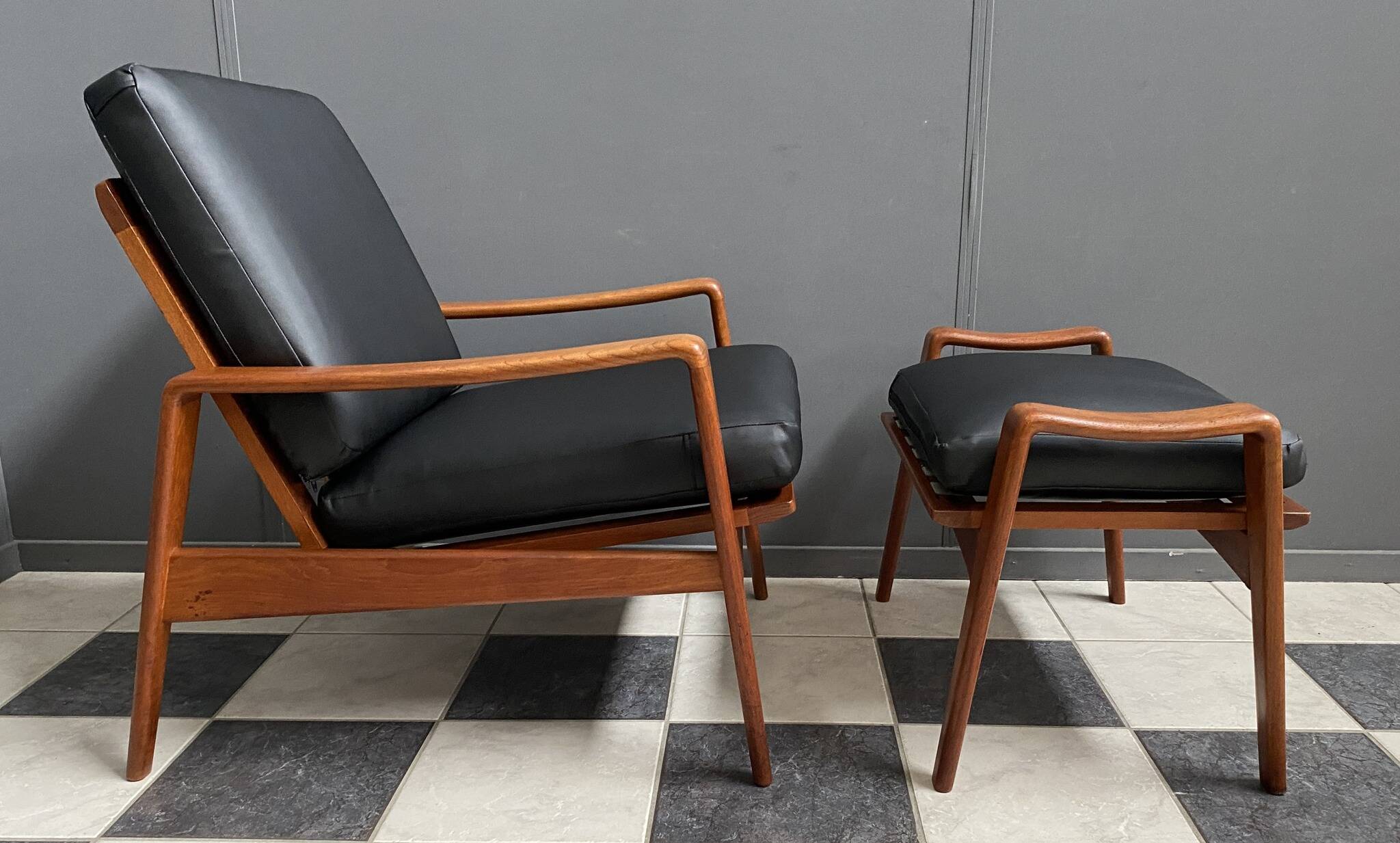 arne Wahl Iversen teak arm chair with ottoman