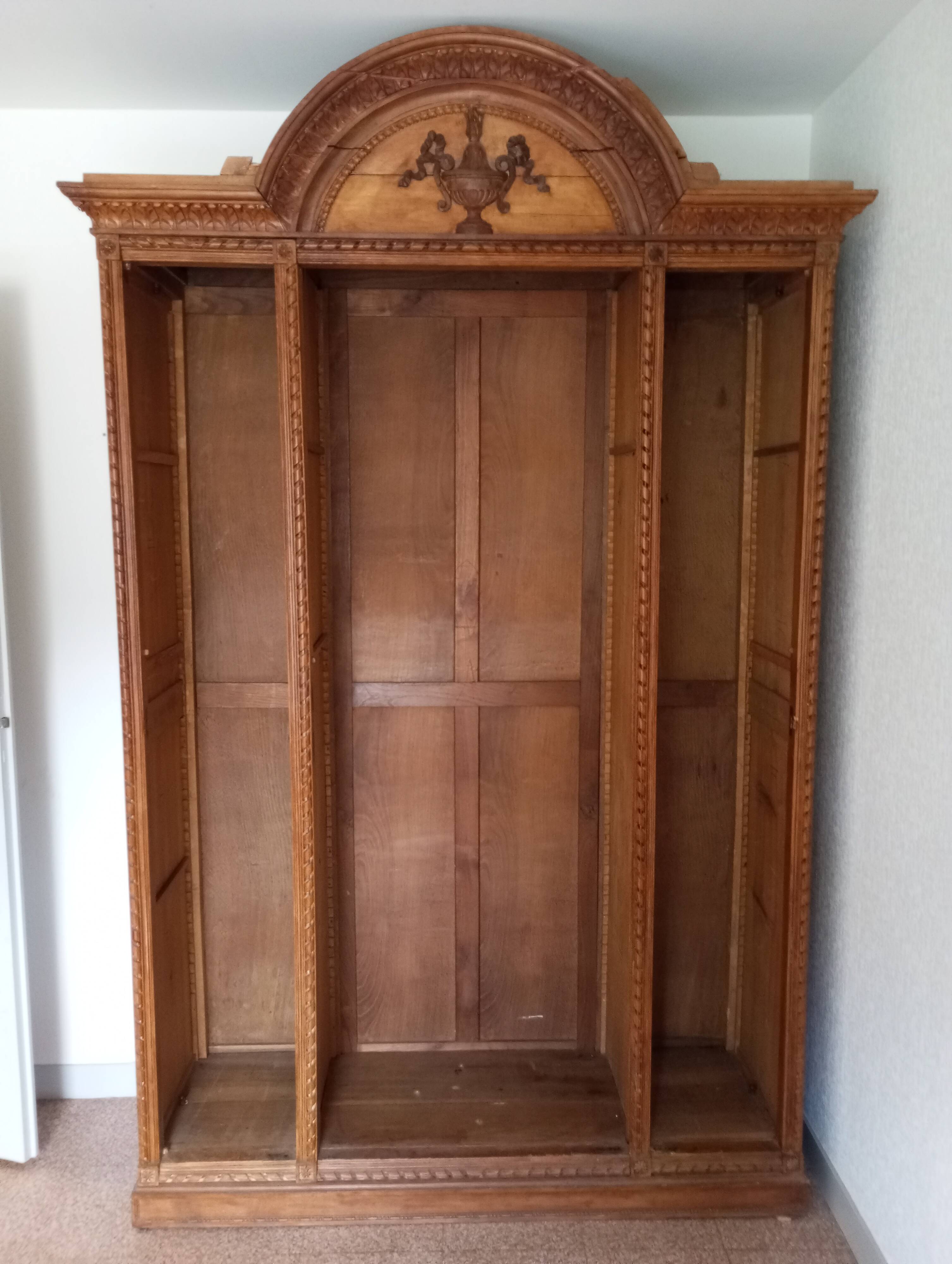 Old and large 3-door wardrobe