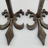 Pair of vintage steel fleur-de-lys andirons