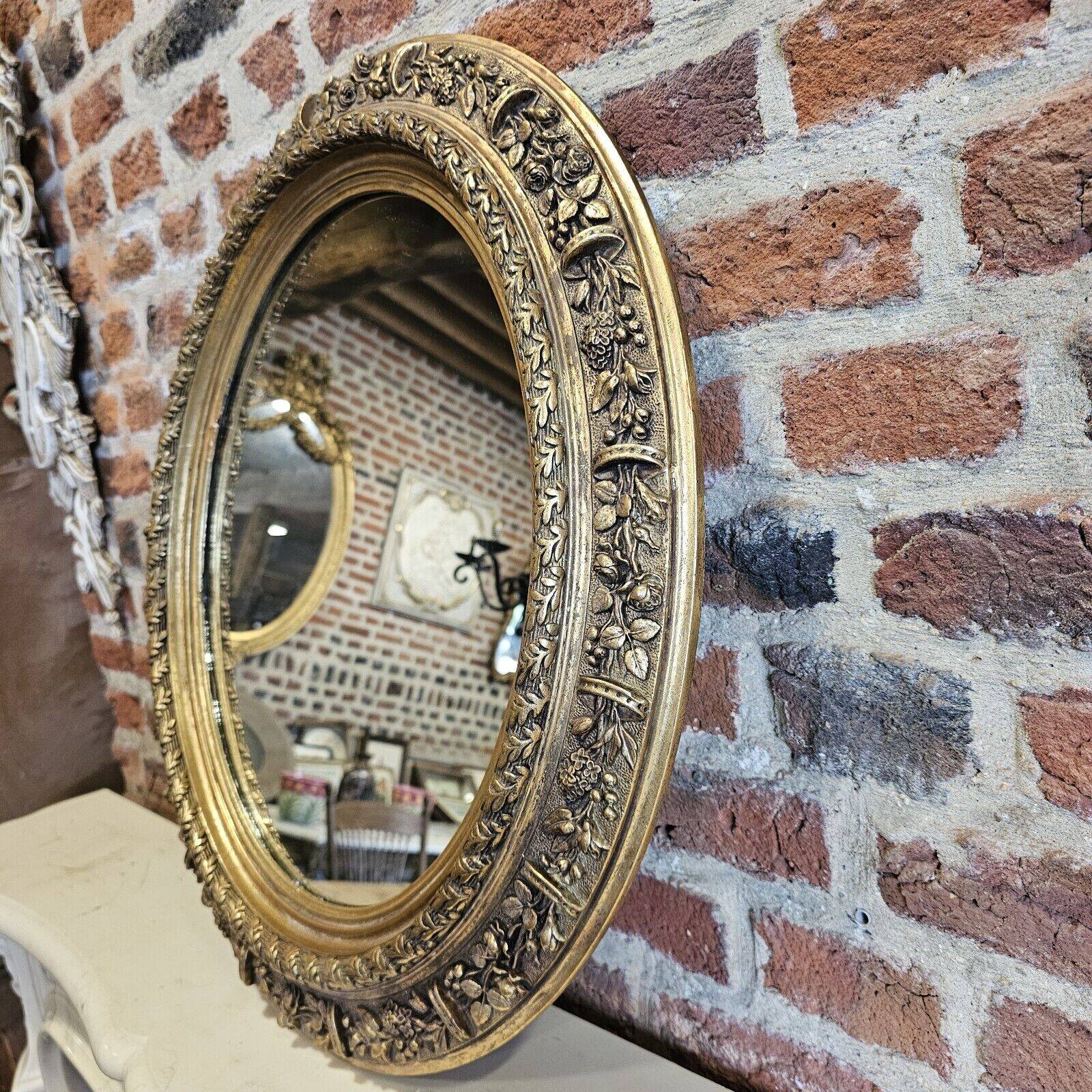 Small oval mirror