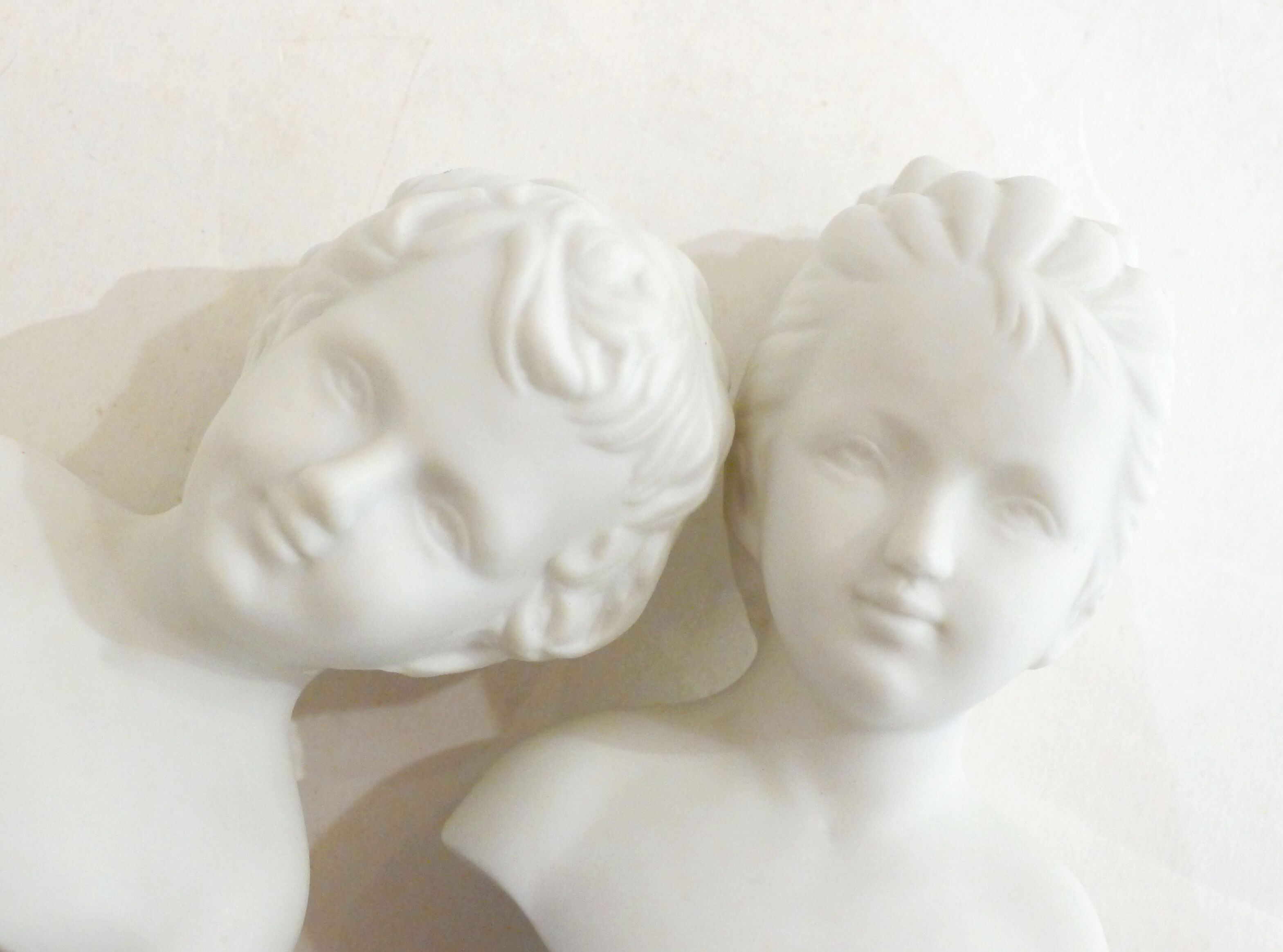 Pair of busts in biscuits