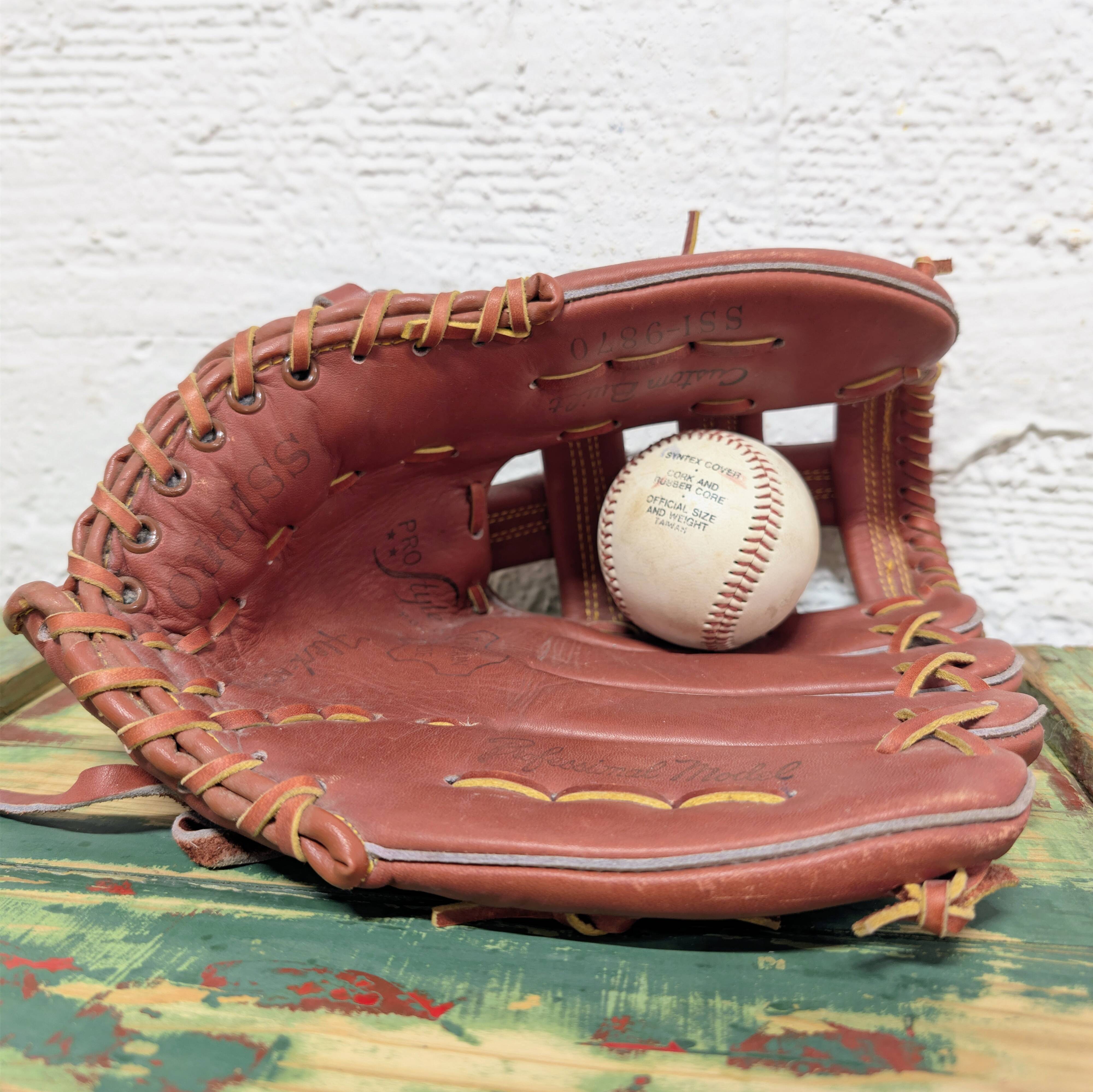 Baseball glove and ball