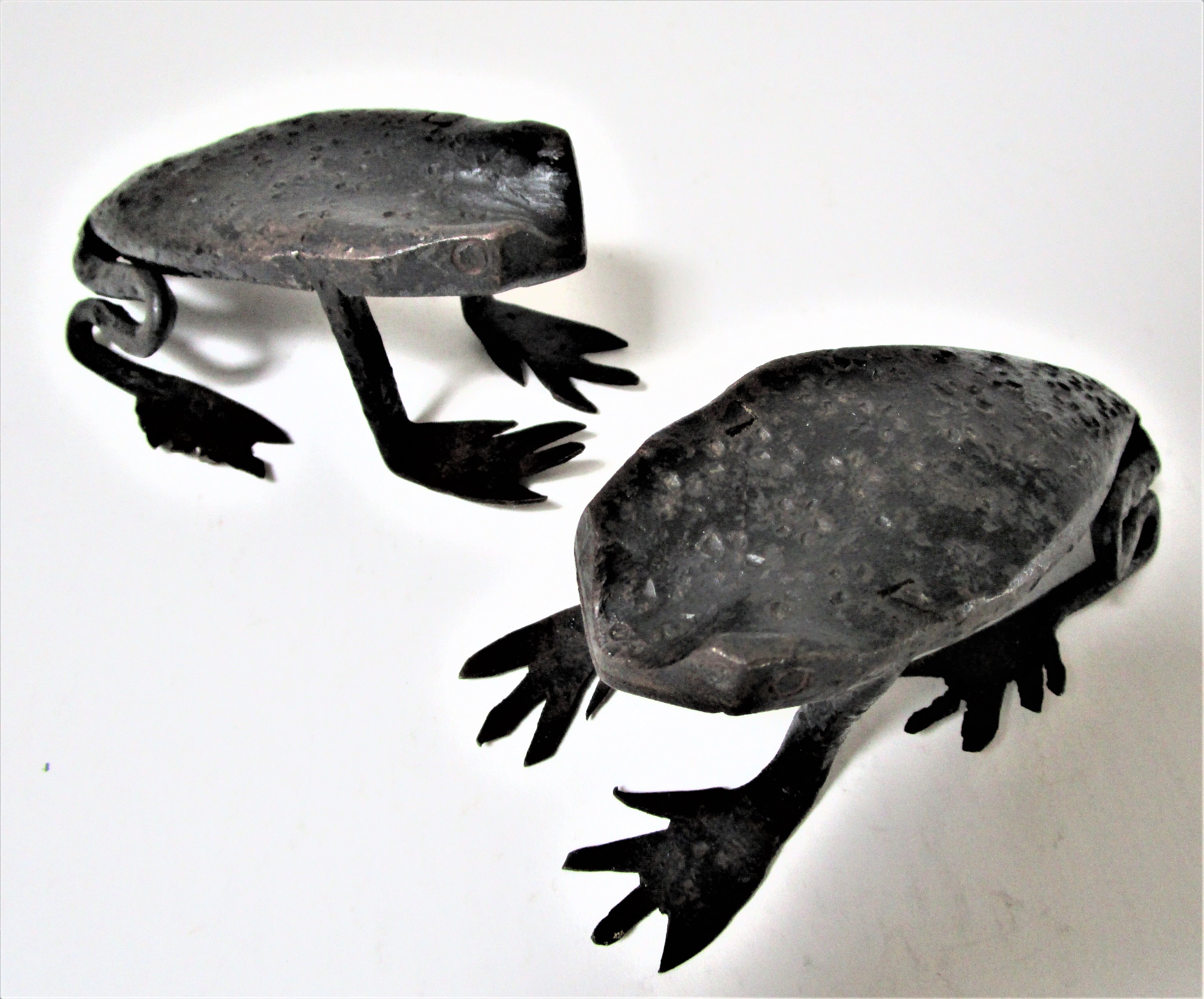 Two metal clipboard frogs patinated vintage brutalist