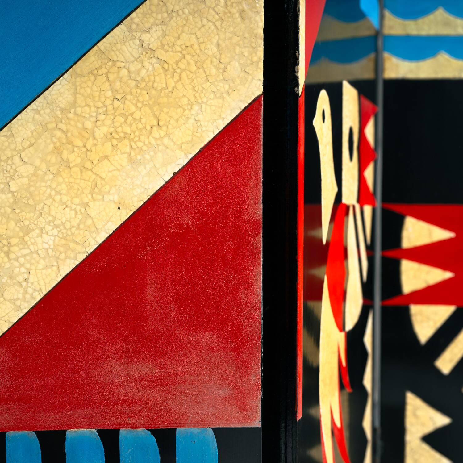 Room divider in art deco style with birds, geometric patterns, red, yellow, blue