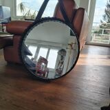 Old rattan mirror with leather strap