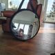 Old rattan mirror with leather strap