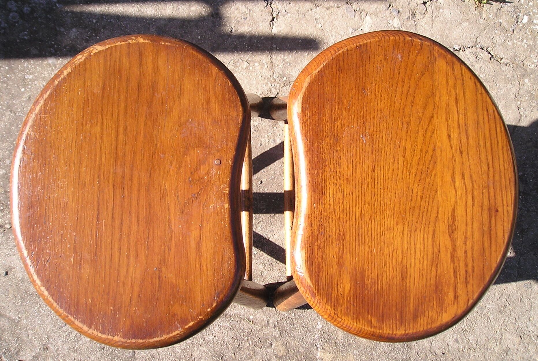 Pair of 70s wooden tripod stools