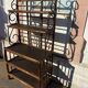 Wicker stand with scrolls shelf