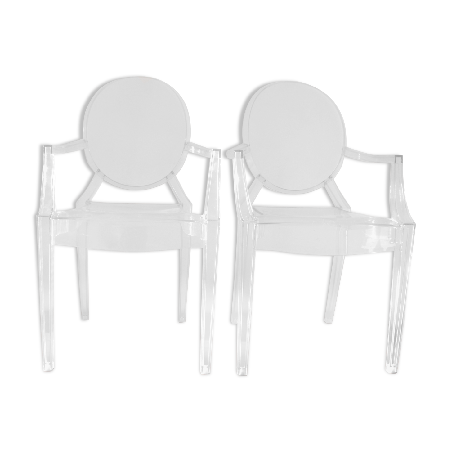 Two Starck chairs transparent model Louis Ghost