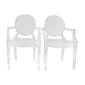 Two Starck chairs transparent model Louis Ghost